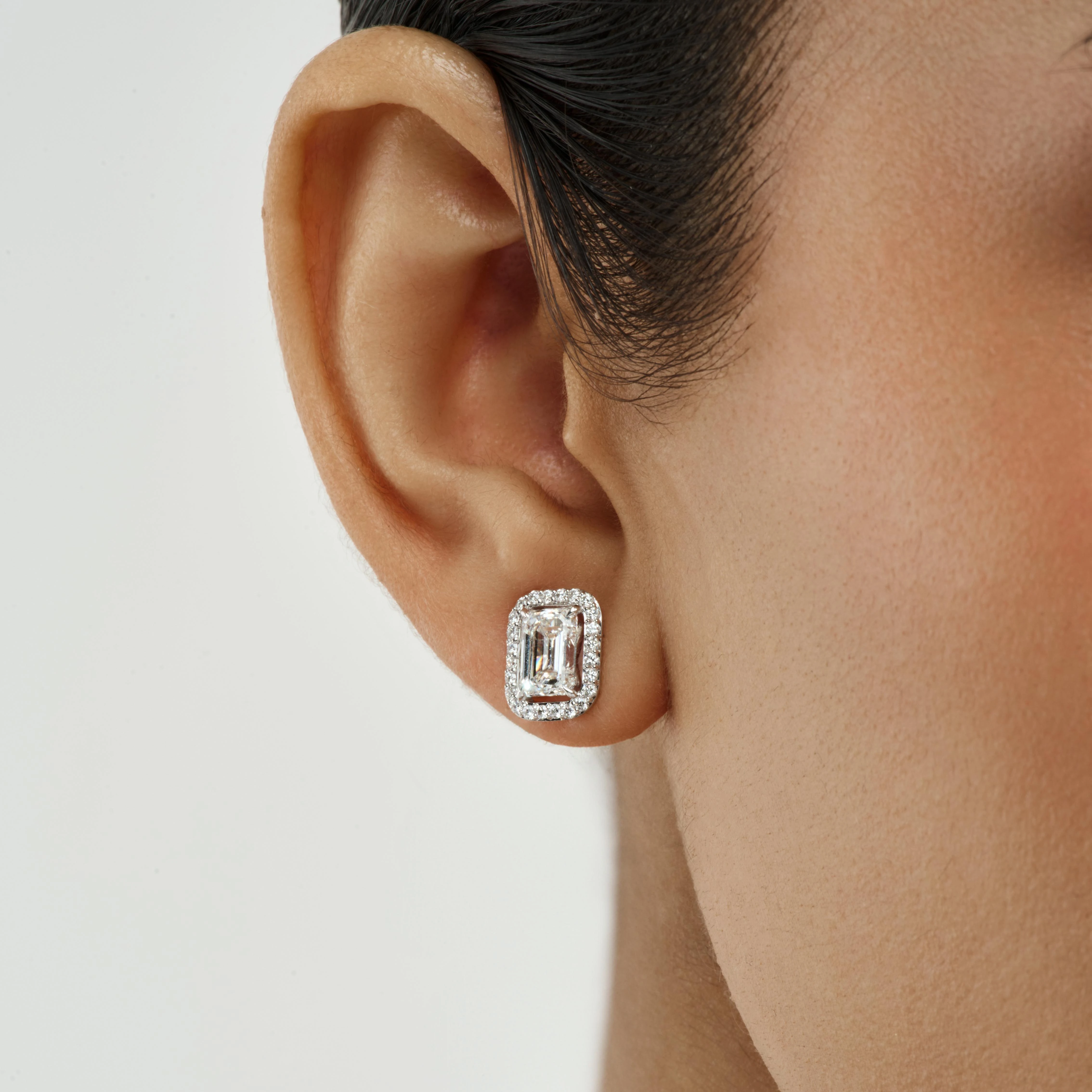 EMERALD-CUT DIAMOND HALO STUD EARRINGS