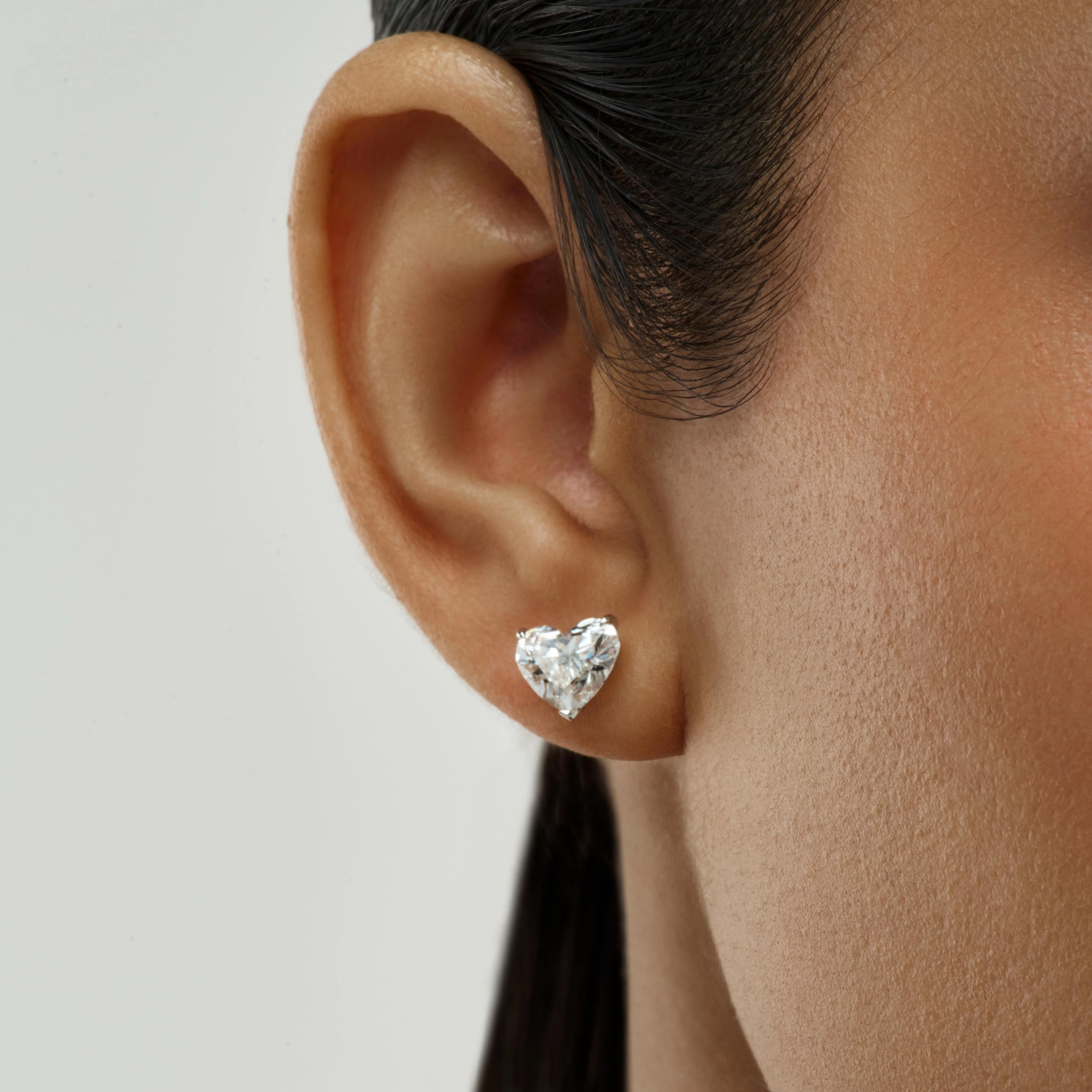 HEART-SHAPED DIAMOND STUD EARRINGS