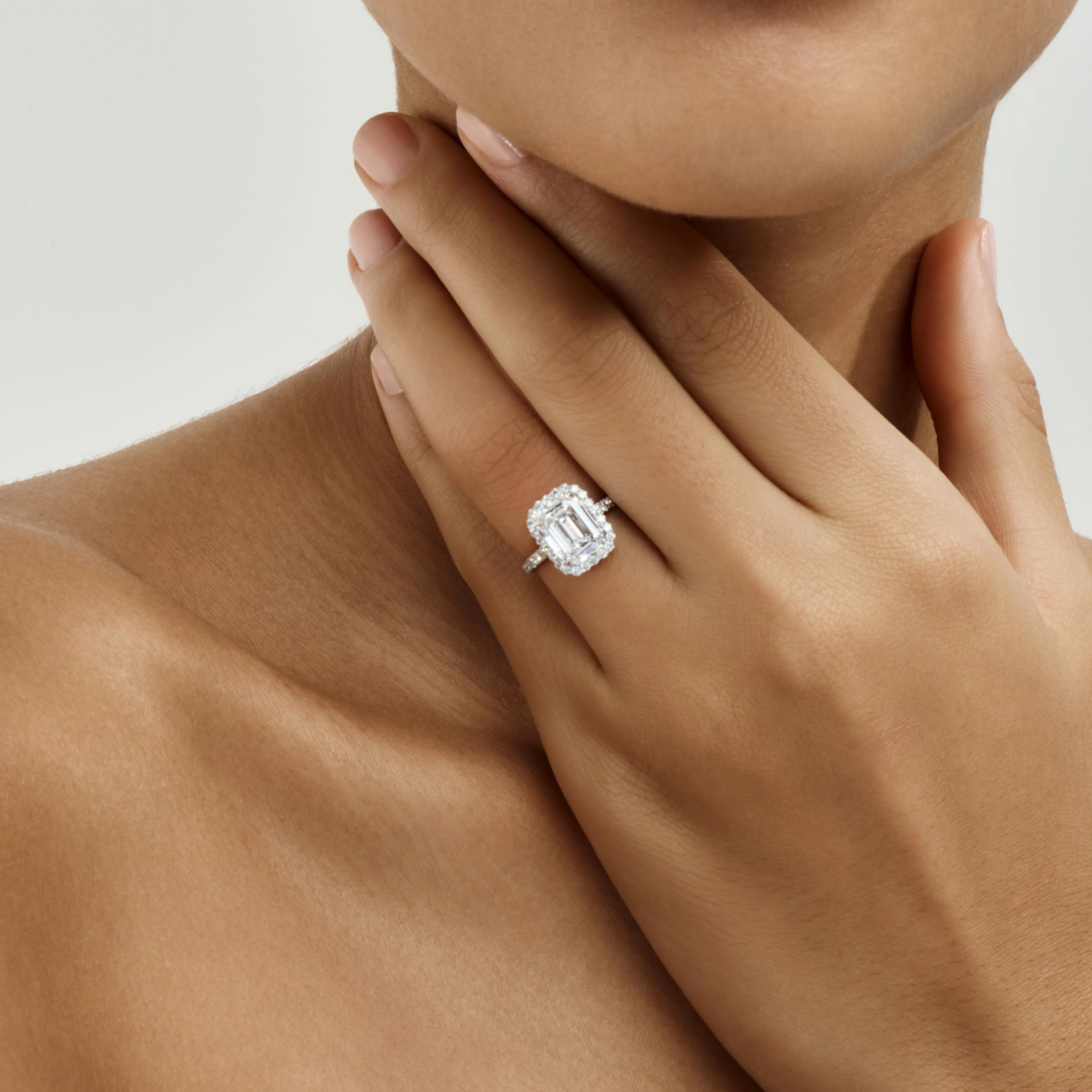 EMERALD CUT PAVÉ DIAMOND RING